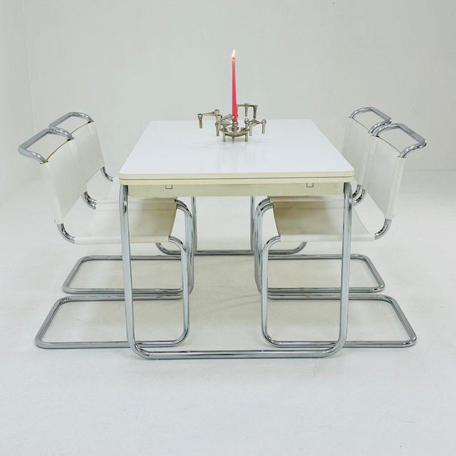 Mid century Bauhaus dining table tubular chrome & wood extendable version Italy 1980s Tubular chrome and white laminate...