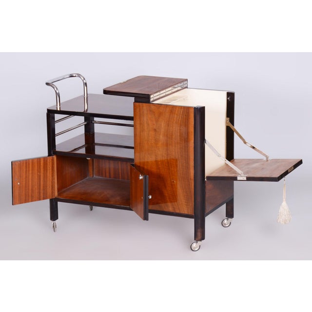 Made by influential Austrian furniture manufacturer Thonet. It has been re-polished with polyutherane piano lacquer by our...