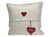 Jan Constantine embroidered pillow featuring her signature wool appliqué crown motif in red, grey, and cream on natural...