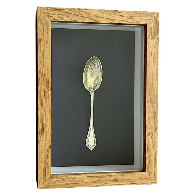 A beautifully presented antique 19th-century sterling silver teaspoon, hand-engraved “Yale” in flowing script. This...
