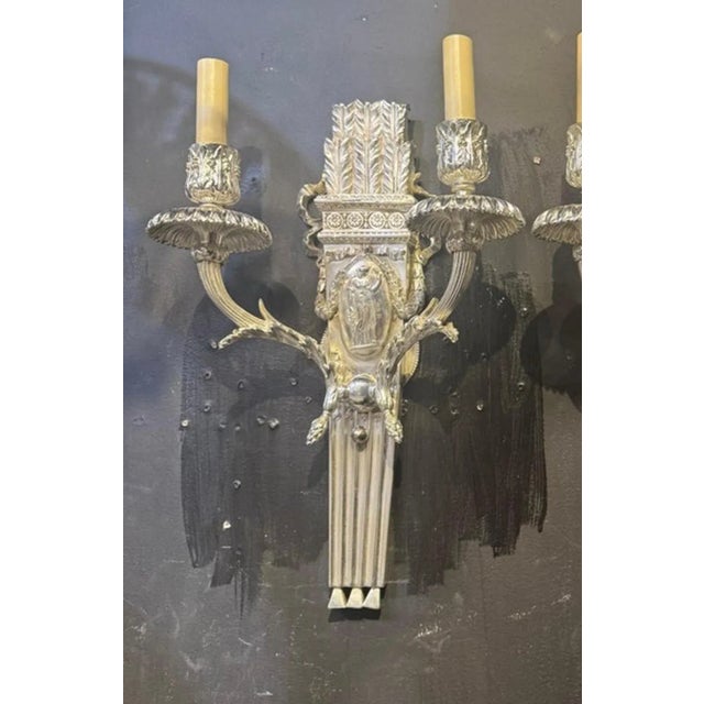 Pair of 1900 silver plated Caldwell two lights sconces neoclassic design