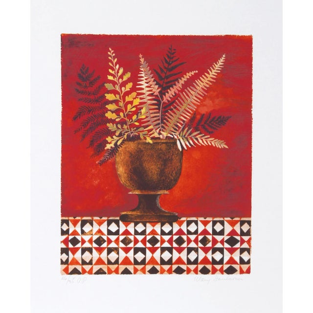 Colored with contrasting hues of yellow, gold, and brown, the fern fronds poking out of the bronze urn in this Mary...