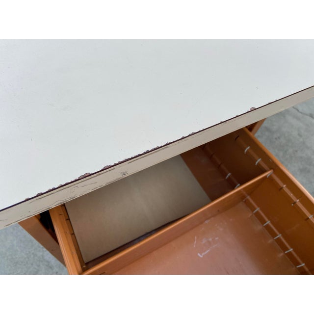 This vintage mid-century modern aluminum Gordon Bunshaft style retro modernist desk is a fully assembled L-shaped desk...