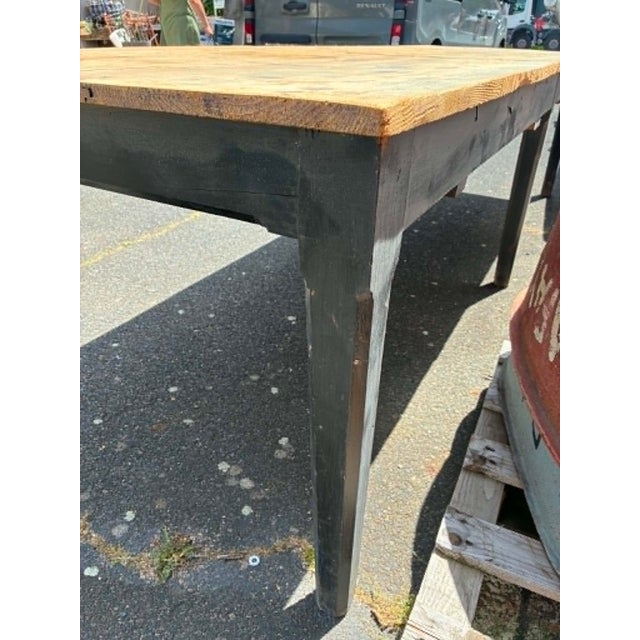 Black fir dining table. A generous size for entertaining! 2 drawers. 6 tapered legs. Dimensions: 88.5 x 279.5 cm. Height:...