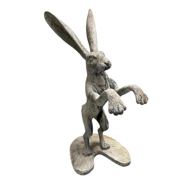 This striking vintage cast iron statue of a leaping or boxing hare. Standing an impressive 38.5 inches tall, this...