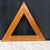Handcrafted antique triangular cribbage board fashioned from beautifully figured hardwood with a rich honey-toned patina....