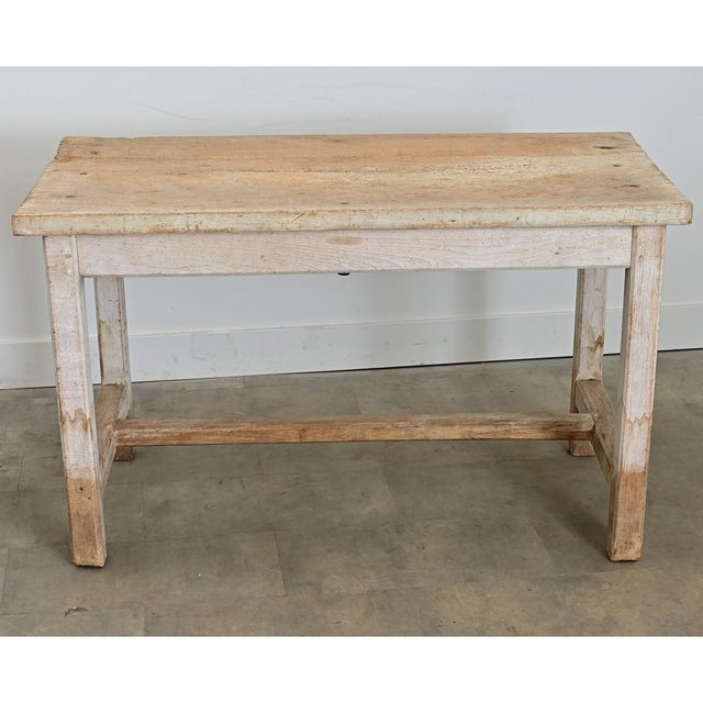 A unique handcrafted beech work table from England, 19th century, its tactile patina would be an inspiring backdrop for...