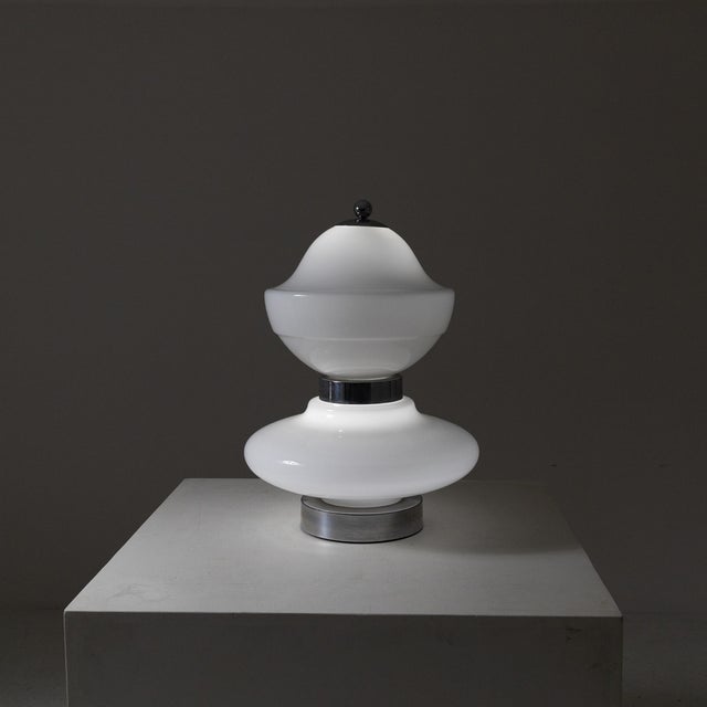 Space Age Chrome and Glass Lamp, 1960s, in Very Good conditions. Designed 1960 to 1969 European Plug (up to 250V).The...