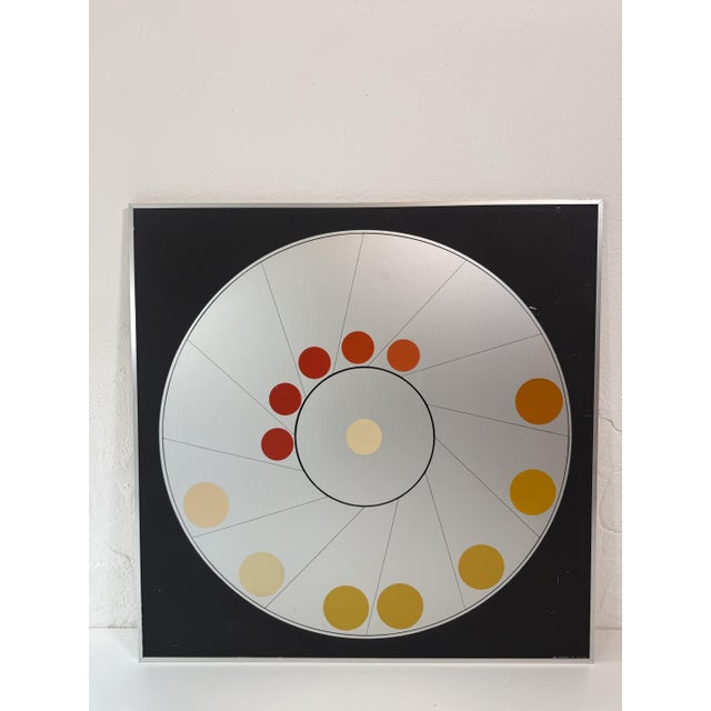 This work represents a kinetic painting created in Italy in the 1970s. It features a geometric decoration in the shape of...