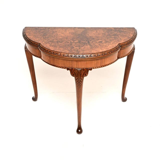 A beautiful antique Queen Anne style burr walnut card table / console table. This was made in England, it dates from...