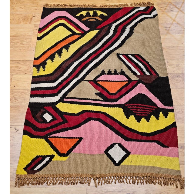 This vintage mid-century modern hand-woven tapestry is a striking example of 20th century textile art at its most abstract...