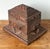 This monumental vintage tramp art box is a breathtaking masterpiece of American folk art, showcasing extraordinary...