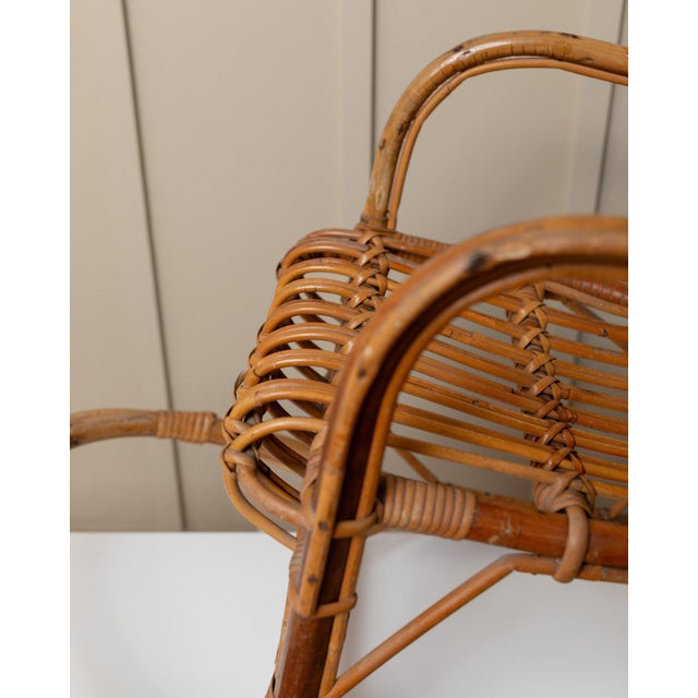 Discover the charm of decades gone by with our unique mid-century bamboo children's chair from the 1970s, designed and...