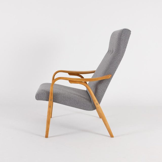 This delicate armchair was designed by the czech designer antonin suman and produced by the company ton. The graceful...