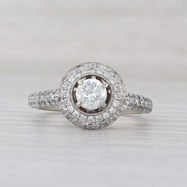 Gemstone Information: - Natural Diamond - Carats - 0.46ct Cut - Round Brilliant Color - G - H Clarity - I1 - Natural...