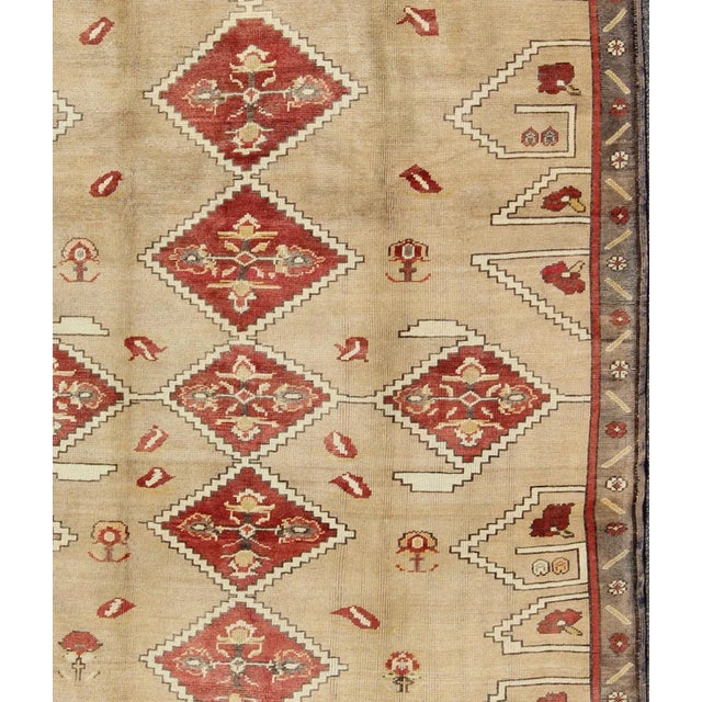 Measures: 5'11 x 7'6. Vintage Turkish Oushak Rug with Bold Diamond Medallions in Red and Beige. Keivan Woven Arts / rug...