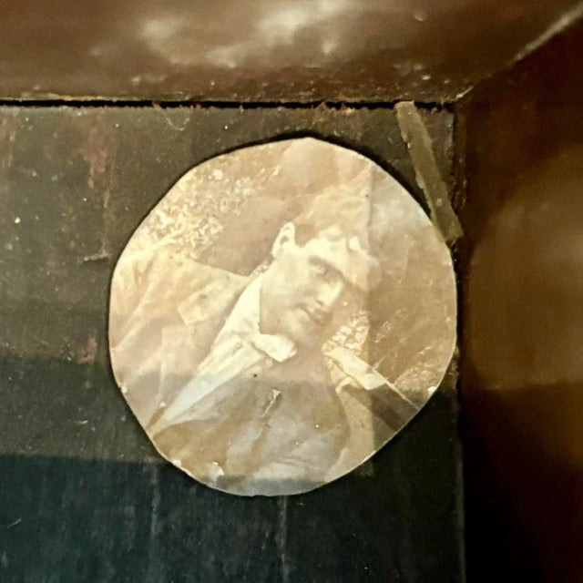 Really fine mahogany inlaidwriting box with two storage compartments, pen storage, a pen sharpener and a bonus photograph...