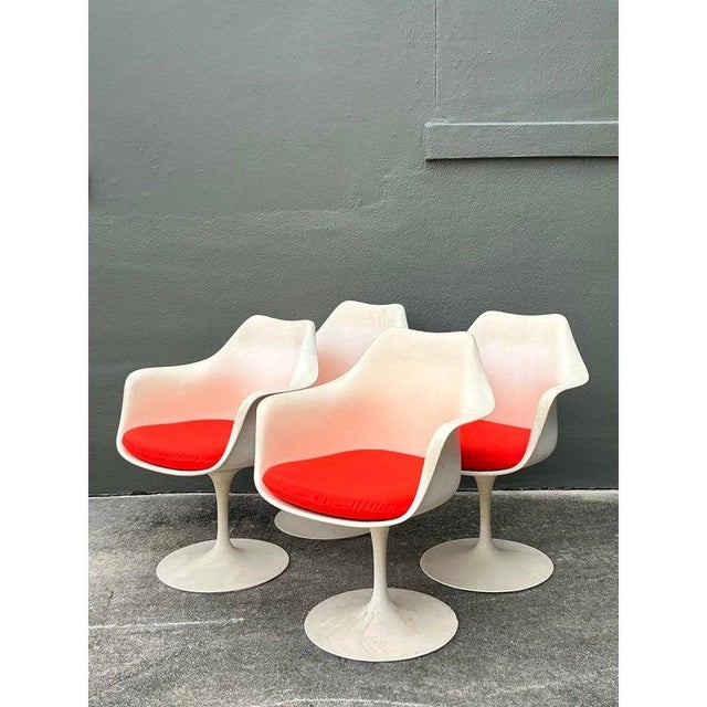 This fantastic set of four dining chairs perfectly captures the Space Age aesthetic of Mid-Century Modern design, highly...