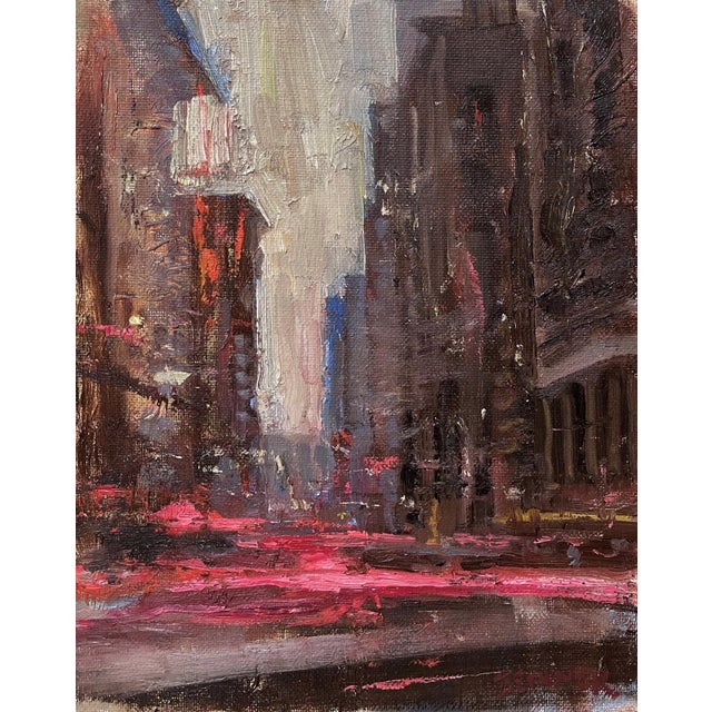 The painting captures a bustling urban scene, where vibrant pinks and muted earth tones depict the motion of city life....