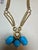Blue 60 Ct Natural Sleeping Beauty Turquoise Necklace, Three Charm 18 Kt Gold For Sale - Image 8 of 8