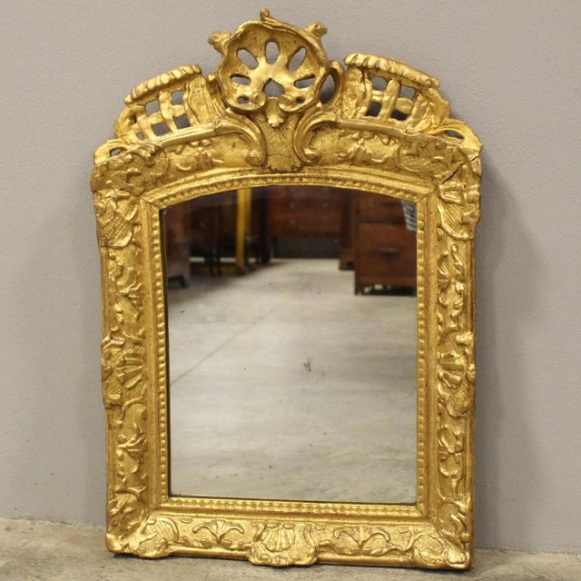 Louis XV mirror In gilded wood Second half of the 18th century - Louis XV Measurements: width 48 cm, height 68 cm In...