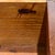 A finely crafted mahogany Queen Anne-style lowboy by Kittinger, featuring a classic five-drawer arrangement, shaped apron,...