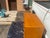 An exceptional, high-end mid-century modern bedroom case goods set featuring clean-lined, minimalist styling. This...