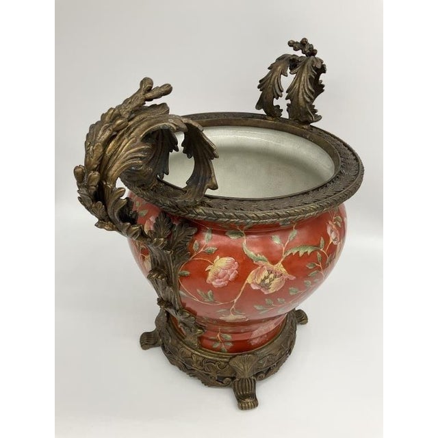 Large Chinese Porcelain Jardiniere with Ornate Cast Metal Mounts An absolutely spectacular statement piece. This...