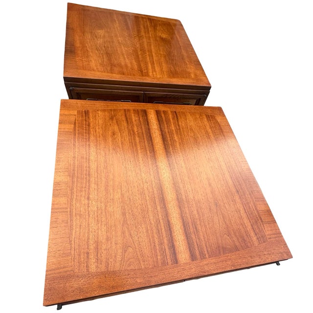 Striking pair of vintage square storage cabinets or end tables featuring beautifully figured wood tops, paneled double...