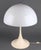 Verner Panton ( Denmark 1926-1998 ), a 1970s "Panthella" plastic table lamp, cream trumpet base/support with white domed...