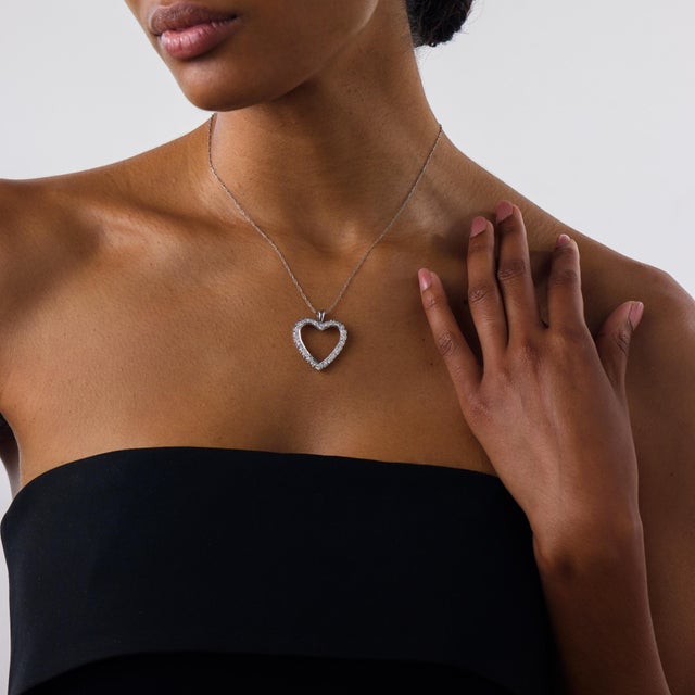 This beautiful vintage diamond heart pendant is a romantic 1990’s piece, designed with timeless sparkle and sentimental...