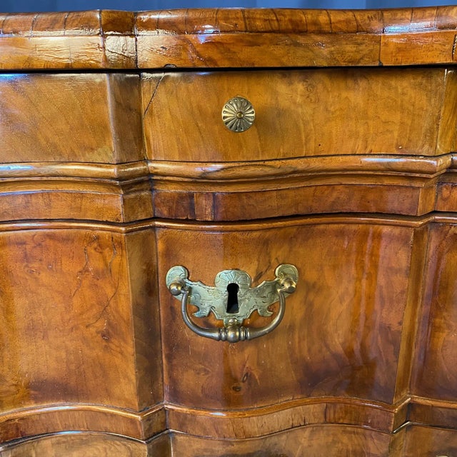 Elegant Dutch Rococo commode or chest of drawers with undulating form and secret top drawer! Chest of drawers with...