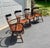 Offered is a set of four Frederick Duckloe & Brothers Windsor style Captain’s chairs. They have a high back with a leather...