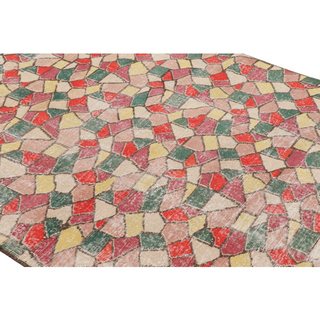 Hand-knotted in wool and originating from Turkey circa 1960 – 1970, this 5x8 vintage Zeki Müren rug is a unique addition...