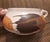 Bring iconic 1970s organic modernism into your home with this striking Royal Haeger "Earth Wrap" planter bowl. Crafted in...