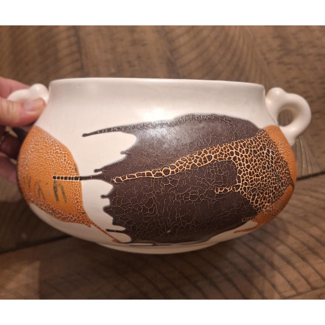 Bring iconic 1970s organic modernism into your home with this striking Royal Haeger "Earth Wrap" planter bowl. Crafted in...