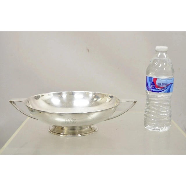 Antique L.B.S. Co. English Sheffield Round Silver Plated Twin Handle Shallow Bowl Dish with Monogram. Item features flat...