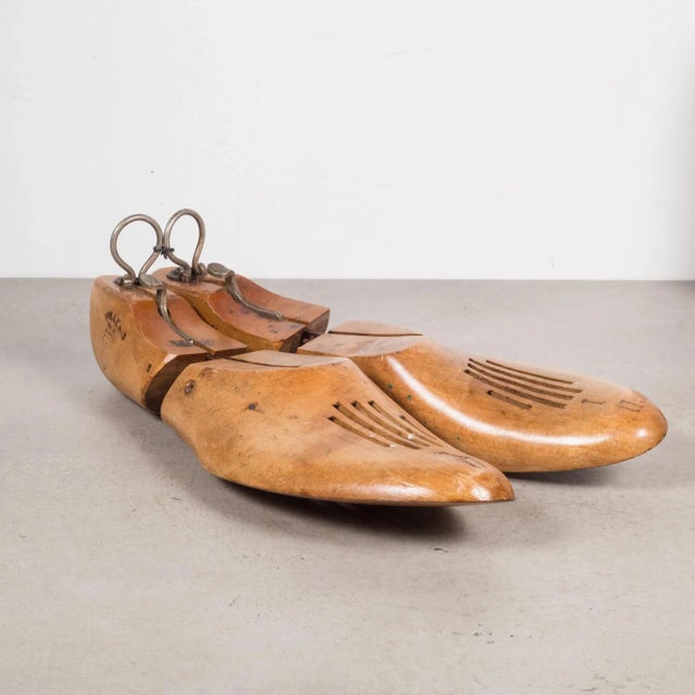 Original pairs of cobbler's wooden shoe forms. They have retained their original finish and have the appropriate wear....
