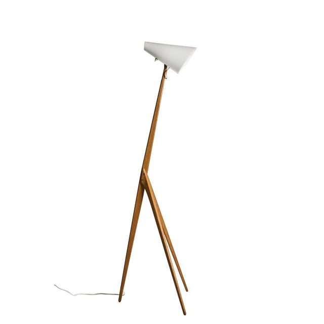 A rare Giraffe floor lamp designed by Uno and Östen Kristiansson for Luxus Vittsjö, Sweden, circa 1950s. The lamp features...
