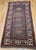 An exceptional 19th century Caucasian Kazak area rug, handwoven in the late 1800s, showcasing five striking Memling Gul...