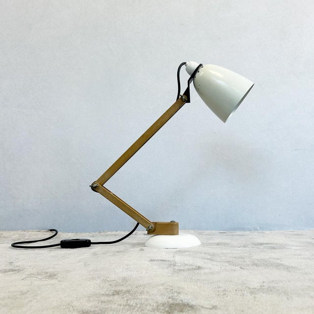 Maclamp desk lamp designed by Terence Conran for Habitat in the 1970s, featuring white adjustable spotlight shade mounted...