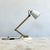 Maclamp desk lamp designed by Terence Conran for Habitat in the 1970s, featuring white adjustable spotlight shade mounted...