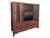 A late 19th Century Tibetan cabinet made with hand hewn carved wood. Hand painted throughout, with auspicious serpentine...