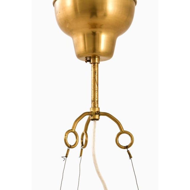 This very rare ceiling lamp, model 59, designed by hans bergström and produced by ateljé lyktan in åhus, sweden, during...