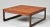 Rosewood coffee table with a square top on two hollowed-out rectangular side supports. "Sofa System Table" model designed...