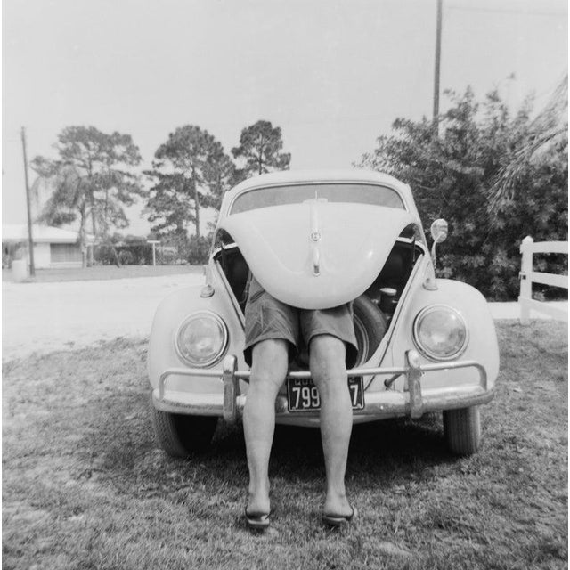 VW Beetle A man reaches into the trunk of a Volkswagen Beetle, November 1962. (Photo by Michael Ochs Archives/Getty...