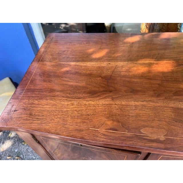 This Antique English Mahogany Server is a timeless piece perfect for adding a touch of elegance to any dining room. Made...