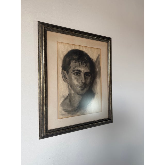 Striking vintage portrait depicting a young man rendered in expressive oil pastel with dramatic shading and a...