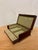 Oak jewelry box, bronze rod, fabric lining.