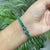 Art Deco Style 10.19 CTW Prong Set Emerald Fine Line Tennis Bracelet - May Birthstone Edition For Sale - Image 11 of 14